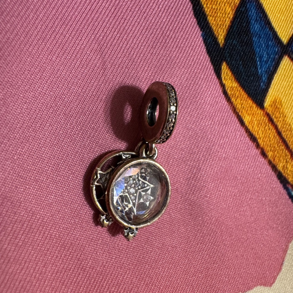 Elegant Silver Charm Pendant